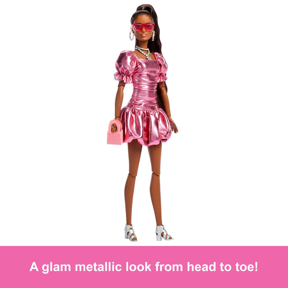 Barbie Deluxe Style Doll #6 wearing silver hoop earrings and layered necklace for glam detail.