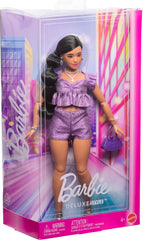 Barbie Deluxe Style Doll metallic outfit close-up inspires fashion imagination.