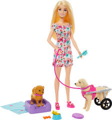 Barbie doll with two dogs in a playful scene for imaginative pet care