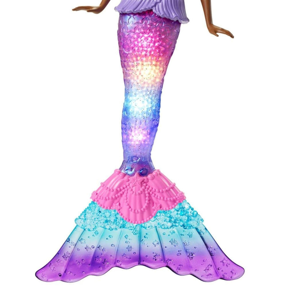 Barbie Dreamtopia mermaid doll features a bodice button for light shows on land.