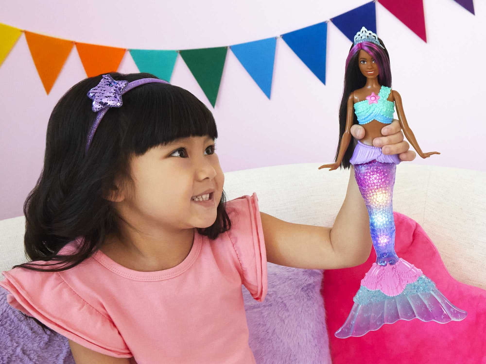 Barbie Dreamtopia mermaid tail displays four colorful light shows in tub.