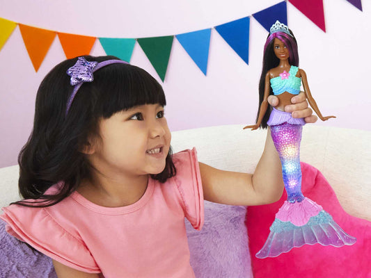 Barbie Dreamtopia mermaid tail displays four colorful light shows in tub.