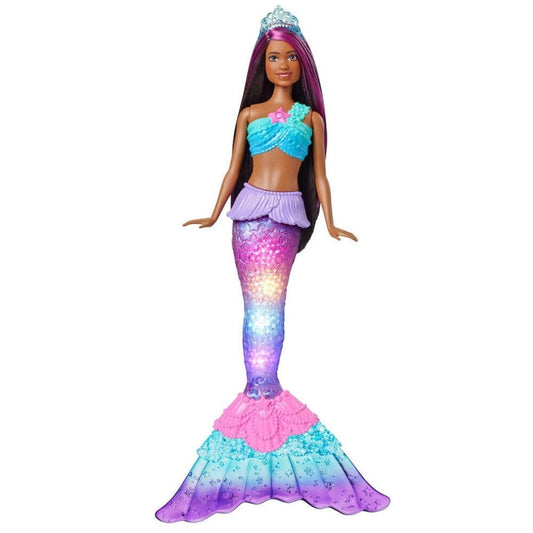 Barbie Dreamtopia mermaid with water-activated tail glowing during bath play.