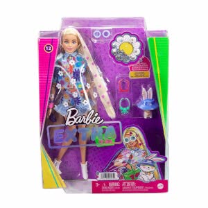 Barbie Extra translucent poncho—flower-power look for mix-and-match outfits.