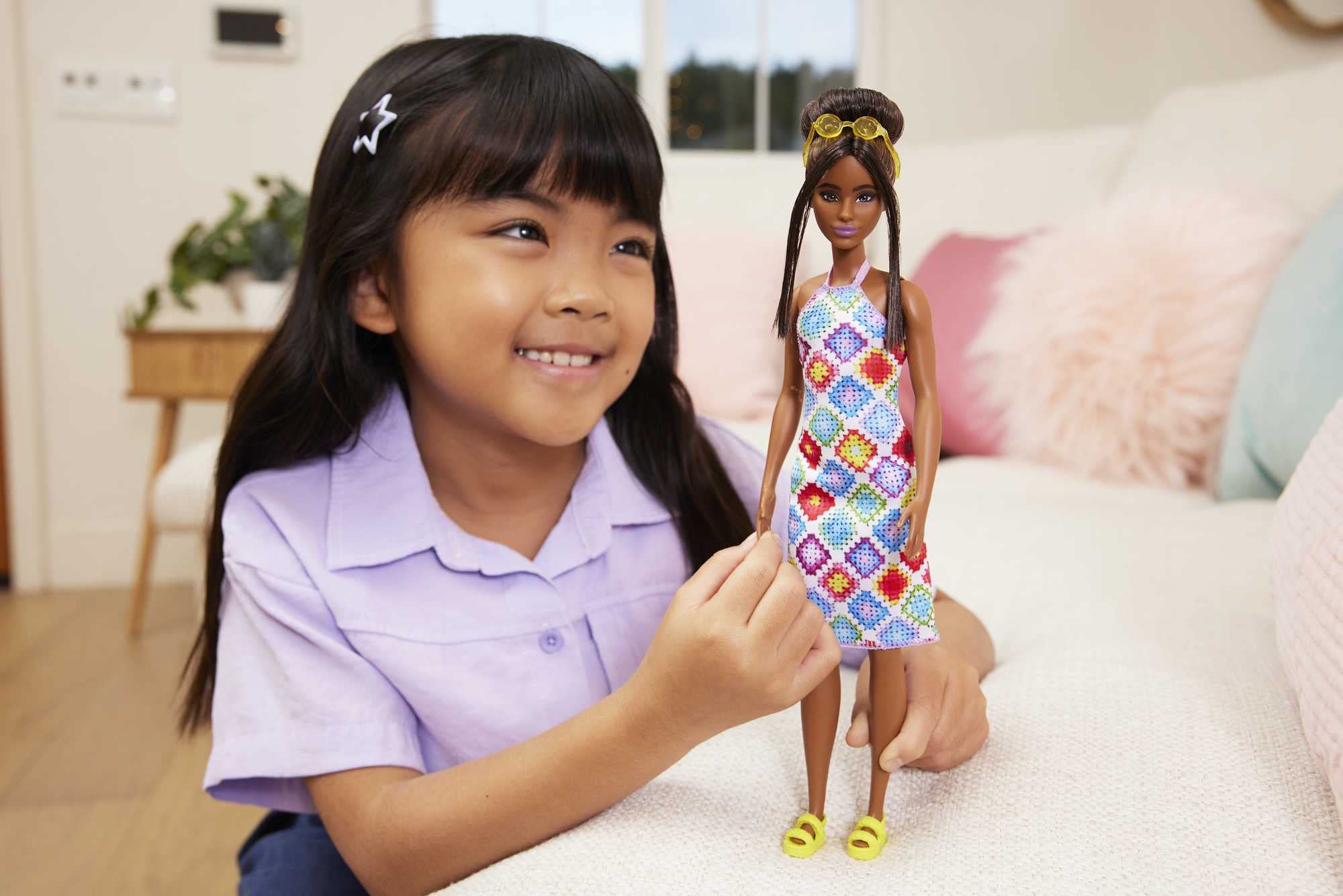 Barbie Fashionistas #210 gold circle sunglasses add instant sunny style.