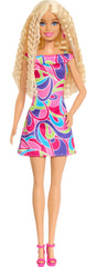 Barbie Fashionistas 65th anniversary emblem emphasizes collectible appeal.