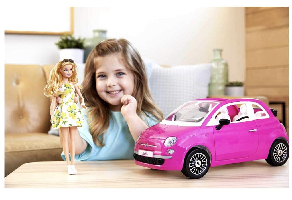 Barbie doll in lemon print dress ready to explore adventures.