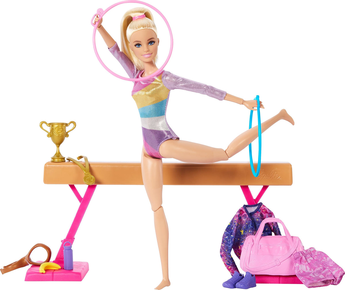 Barbie Gymnastics Doll using flip clip to perform flips and cartwheels for imaginative routines.
