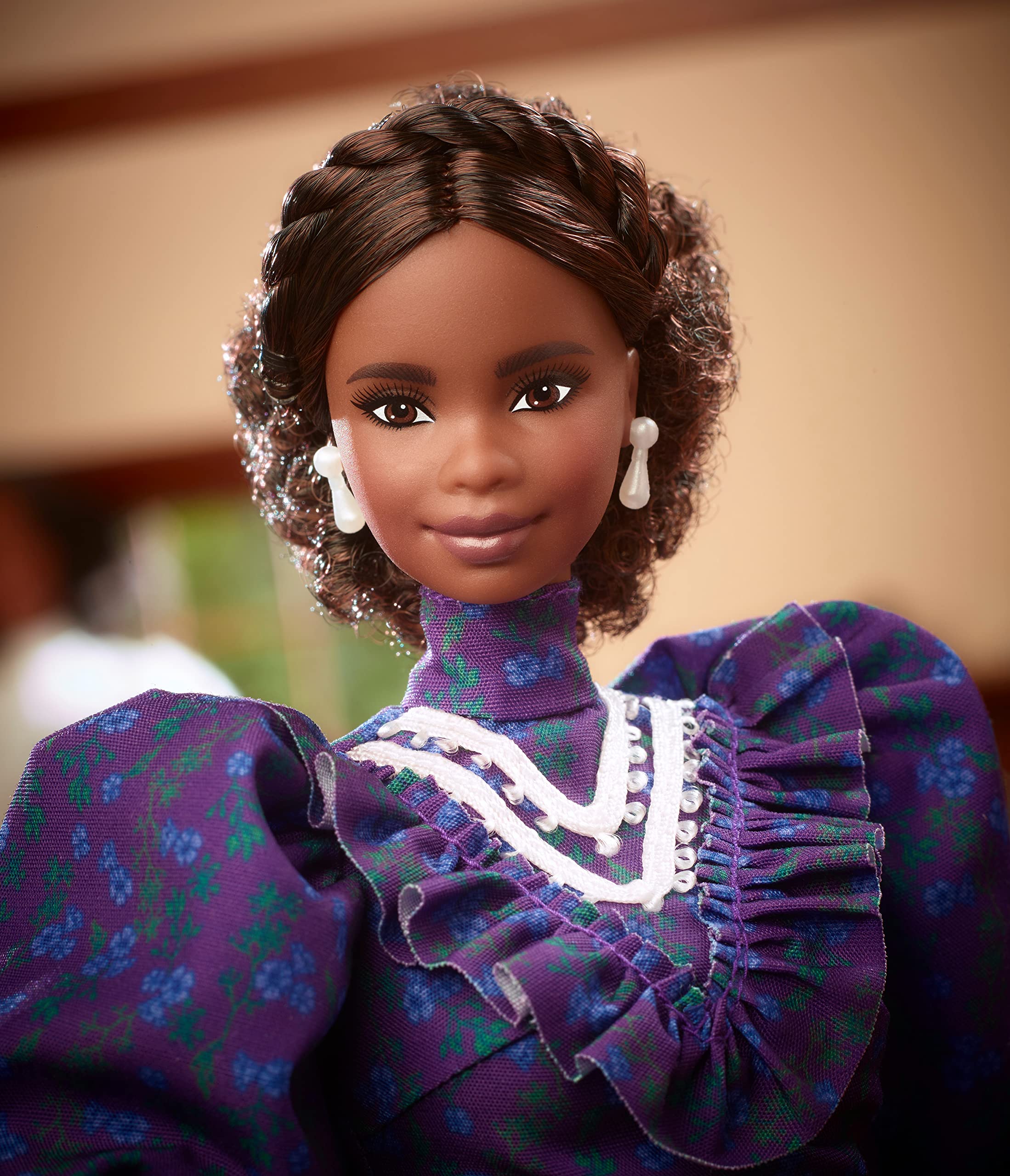 Barbie Inspiring Women hair grower accessory showcases historical beauty rituals for display.