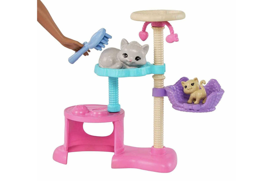 Barbie Kitty Condo includes a spinning rope toy for kitten fun.