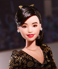 Kristi Yamaguchi gold-leotard Barbie showcases iconic Olympic style.