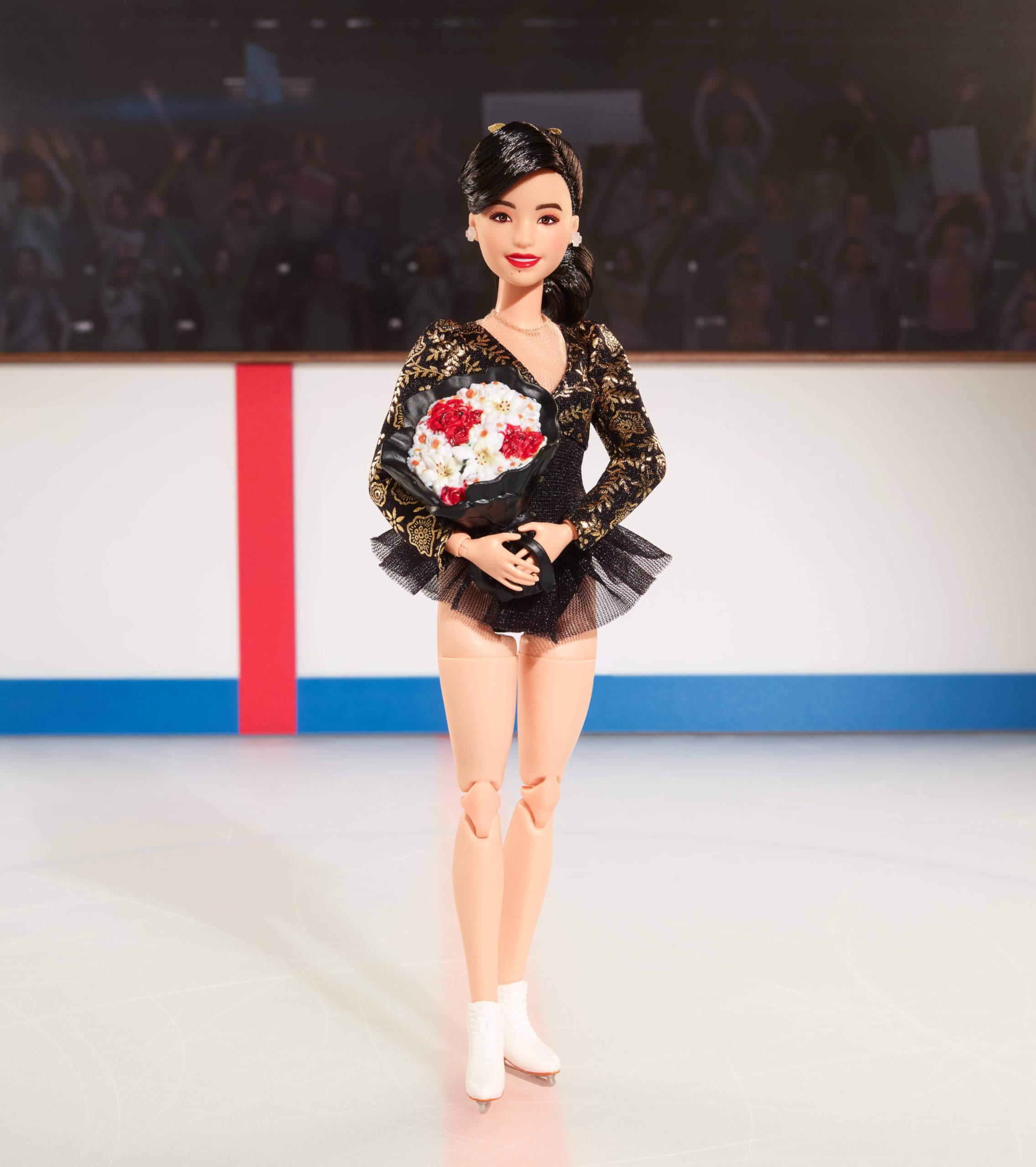 White skates complete Kristi Yamaguchi Barbie’s performance-inspired outfit.