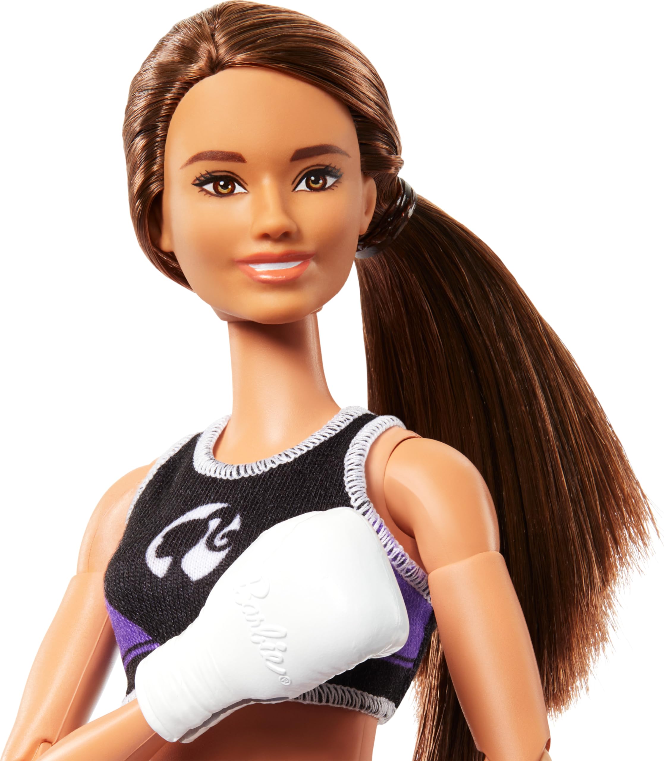 Barbie Made to Move boxer doll wearing boxing gloves supports imaginative sports battles.