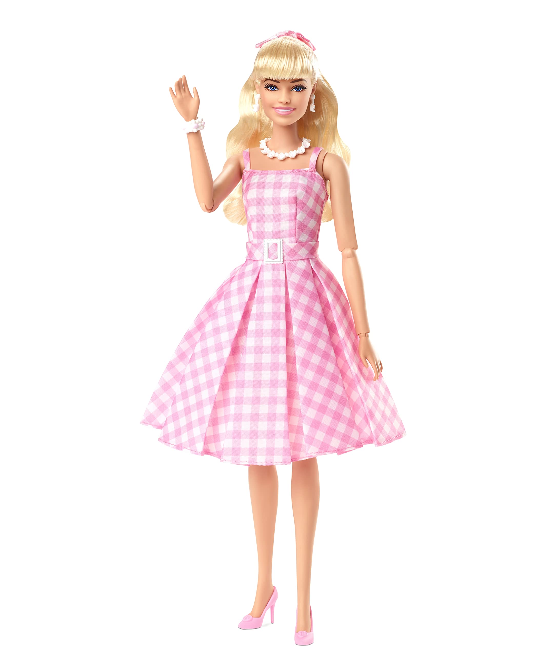 Barbie The Movie doll with half‑up hair and pink ribbon