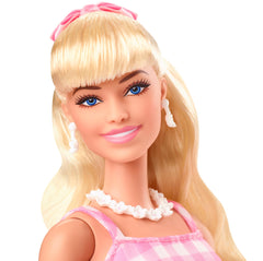 Barbie The Movie doll wearing pink pumps for a complete look