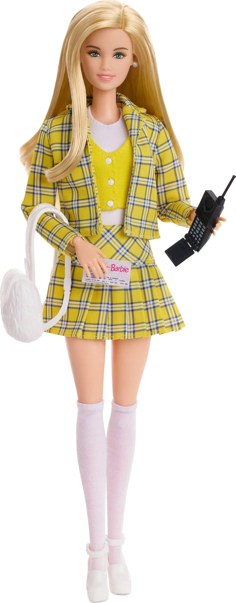 Cher doll with white mini backpack, great for display and imaginative play.