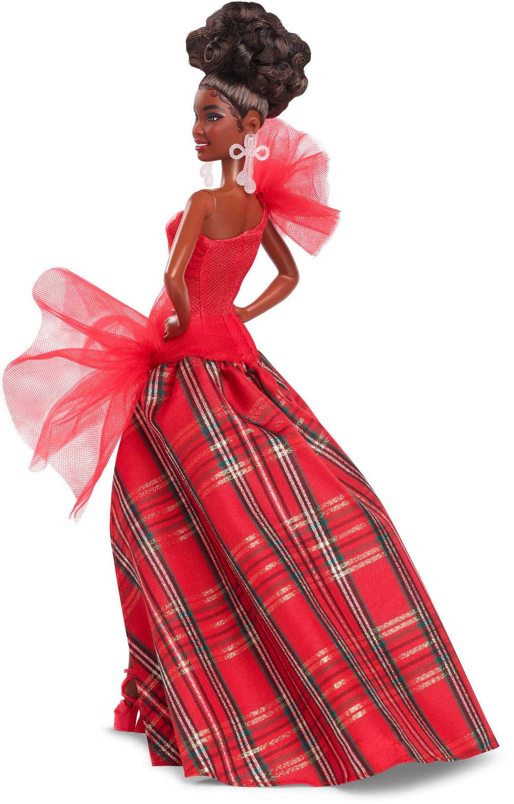 Barbie Signature Doll showcases gold nails and matching heels for a polished look.