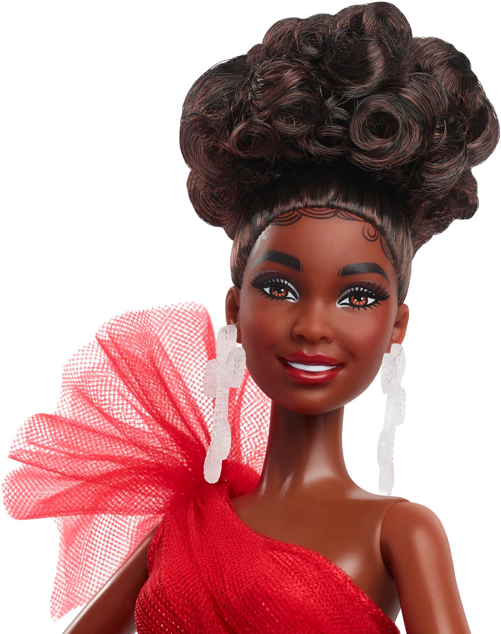 Barbie Signature Doll in plaid ballgown skirt adds seasonal collectibility on a shelf.