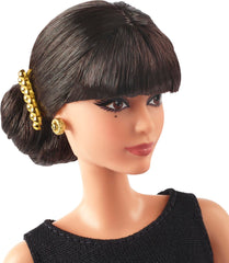Barbie Rita Moreno gown detail highlighting the black and gold look.