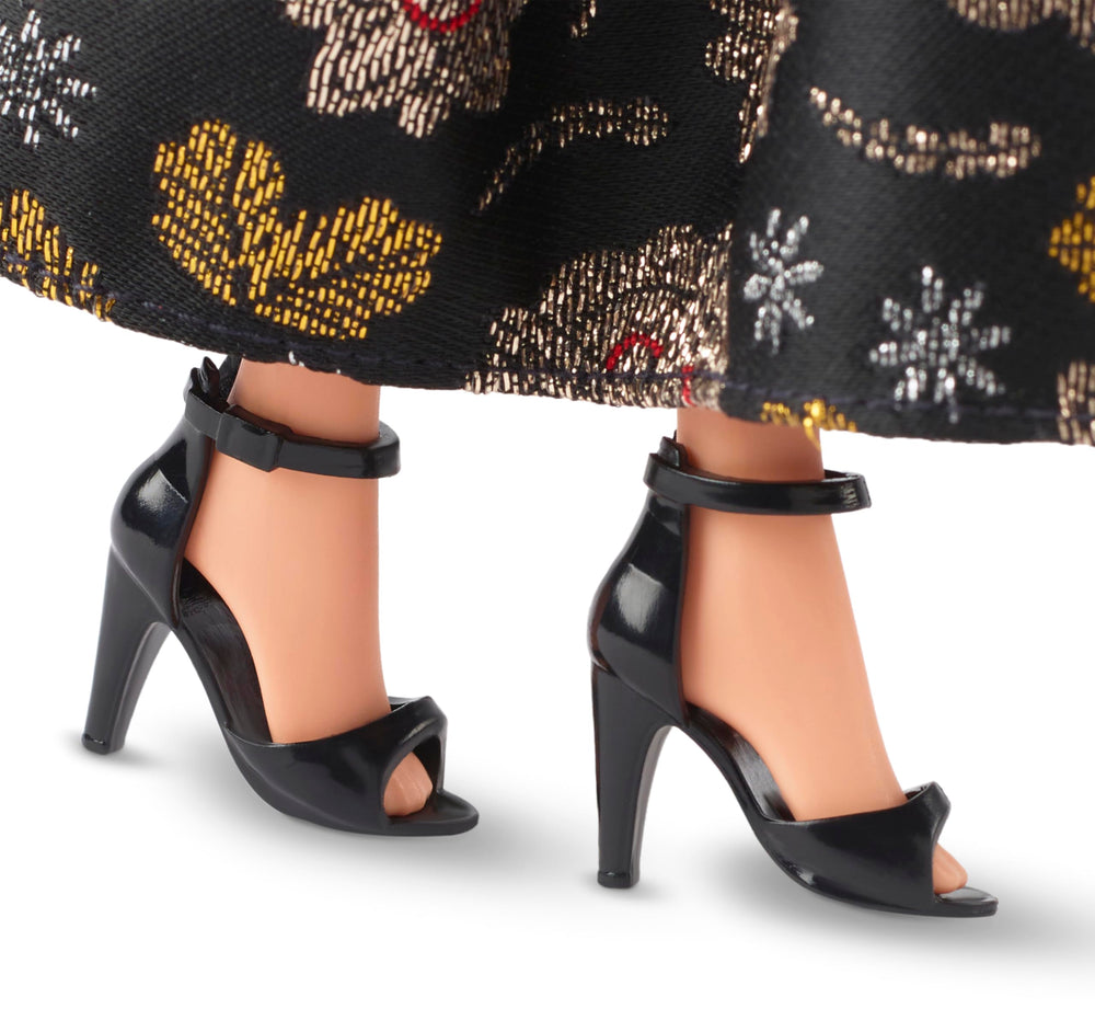 Barbie Rita Moreno classic heels completing the elegant ensemble.