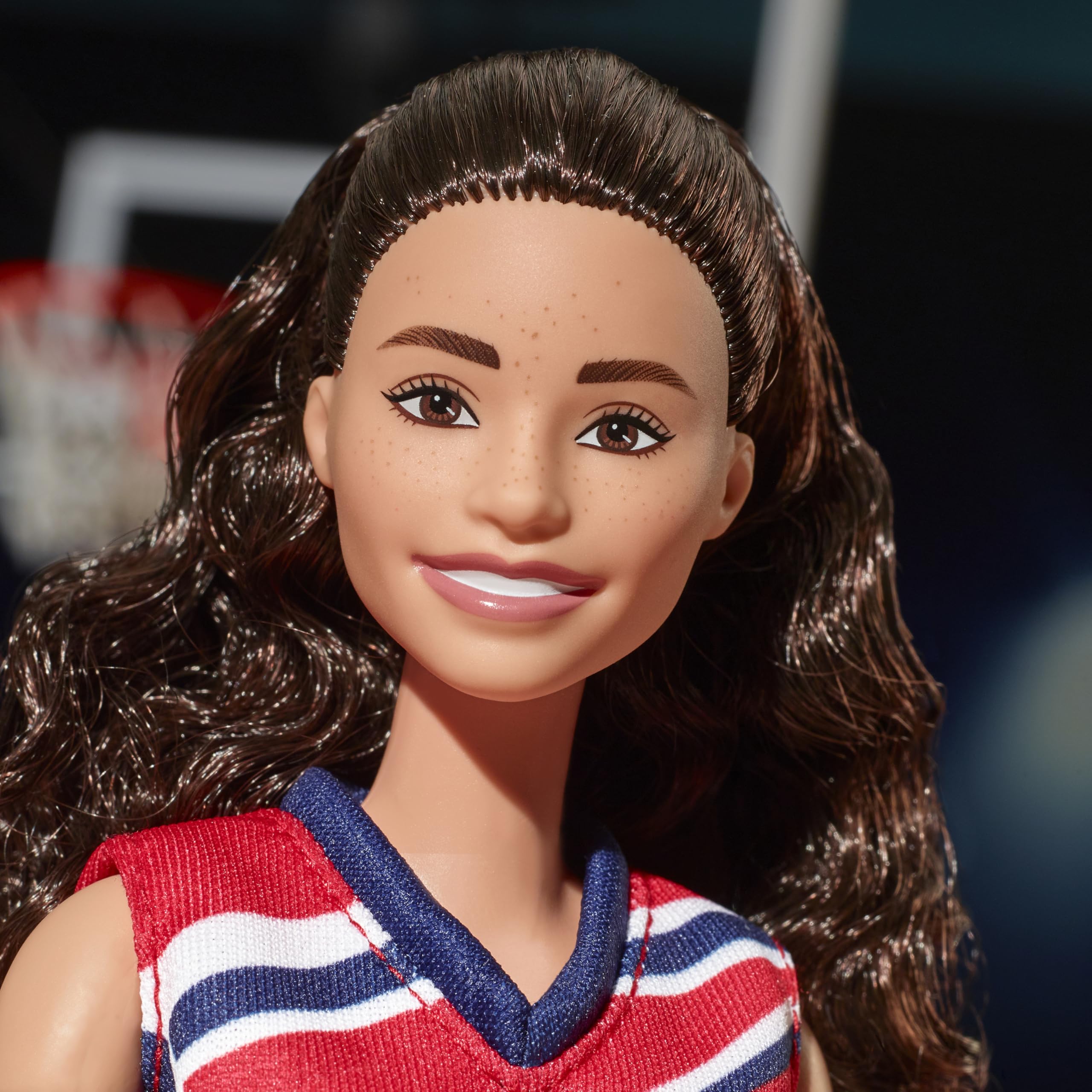 Barbie Sue Bird doll comes with a basketball to practice realistic shots.