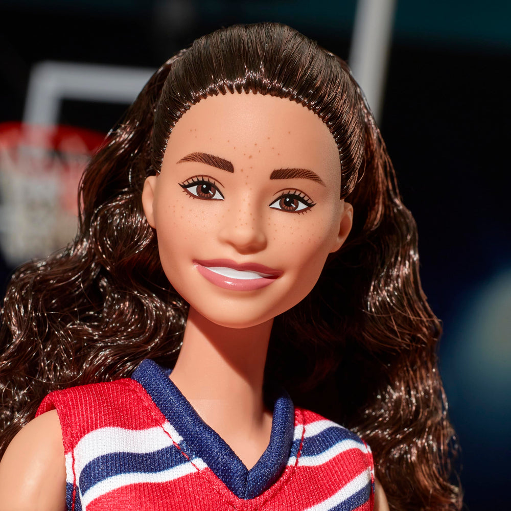 Barbie Sue Bird doll comes with a basketball to practice realistic shots.