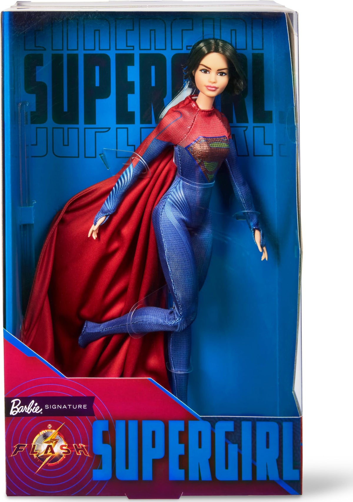 Barbie Supergirl doll in red and blue suit with cape for display and collection.