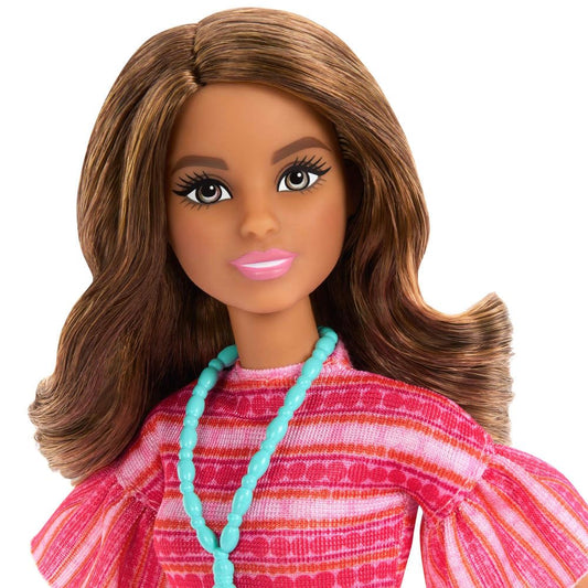 Barbie Teresa doll wearing white booties for dress up