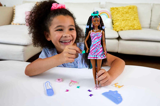 Barbie Totally Hair color-change clips show warm-activated color shifts.