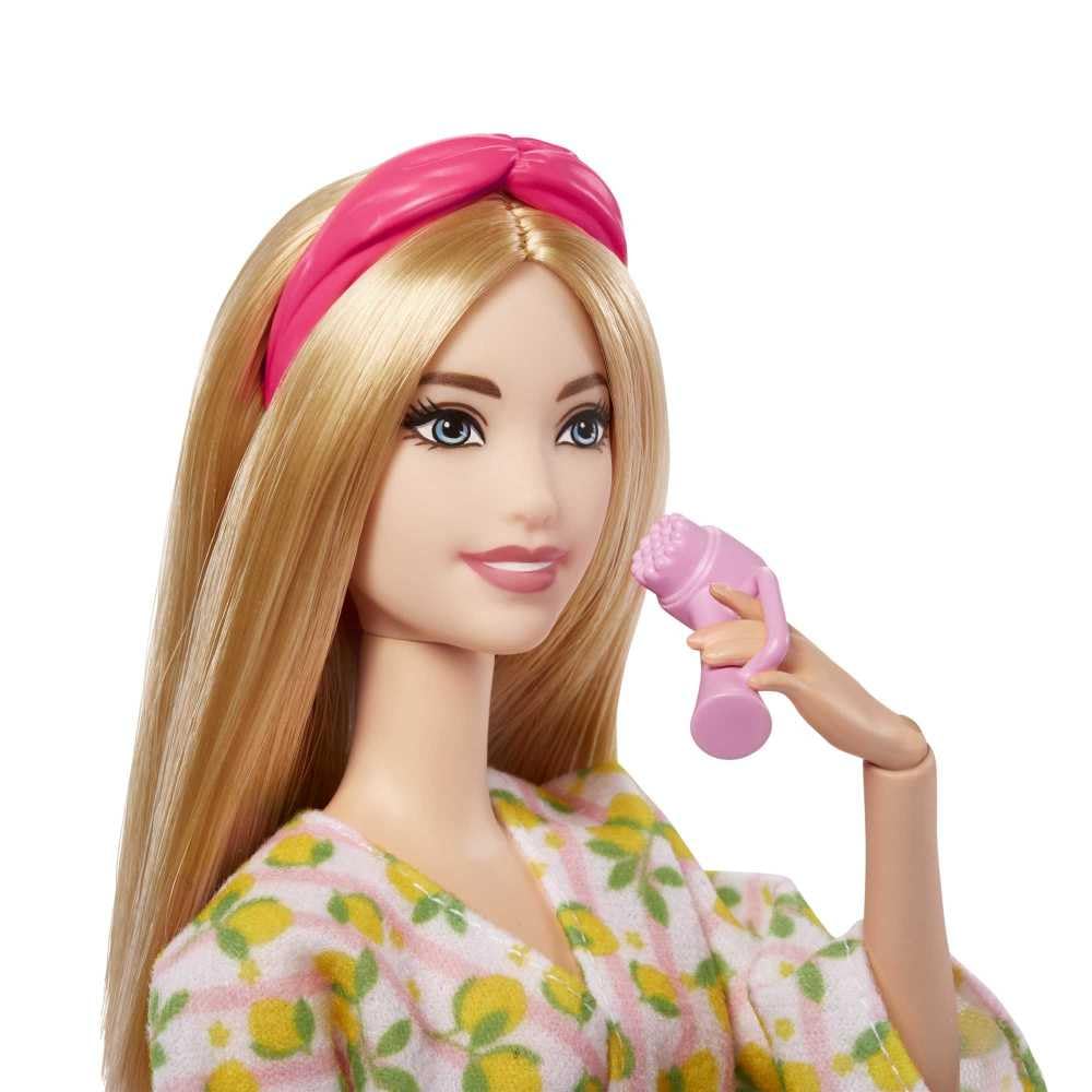 Barbie towel, headband, and slippers complete cozy spa look for playtime.