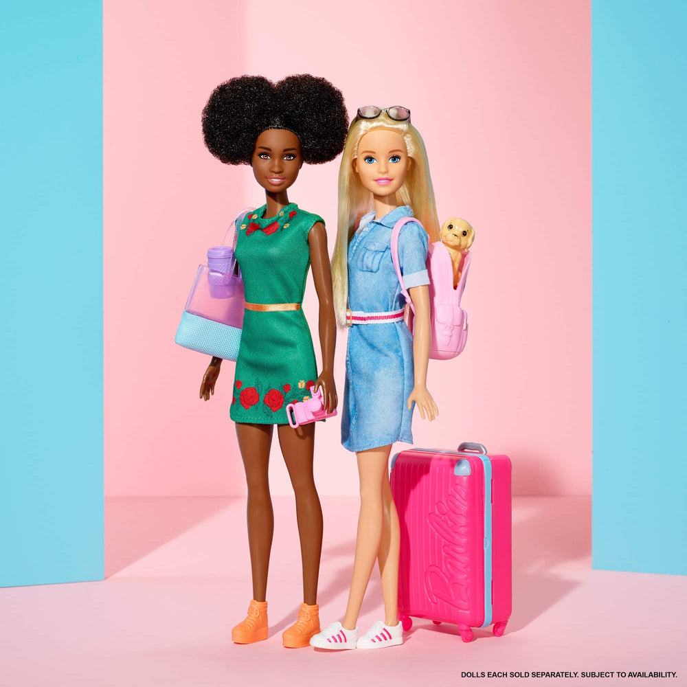Barbie Travel Nikki doll in green dress with floral accents, ideal for storytelling
