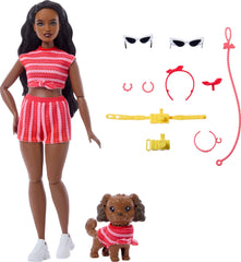 Barbie Twinning Looks camera and leash boost storytelling on pretend strolls.