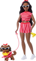 Barbie Twinning Looks doll and pet outfit in matching red stripes for imaginative play.