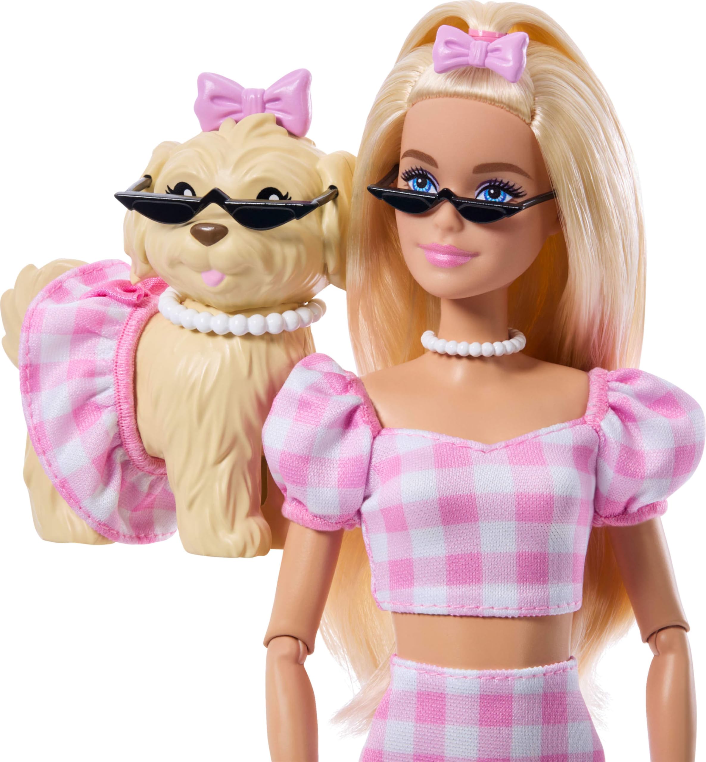 Barbie in pink heels and puff sleeves showcases stylish dress-up options.