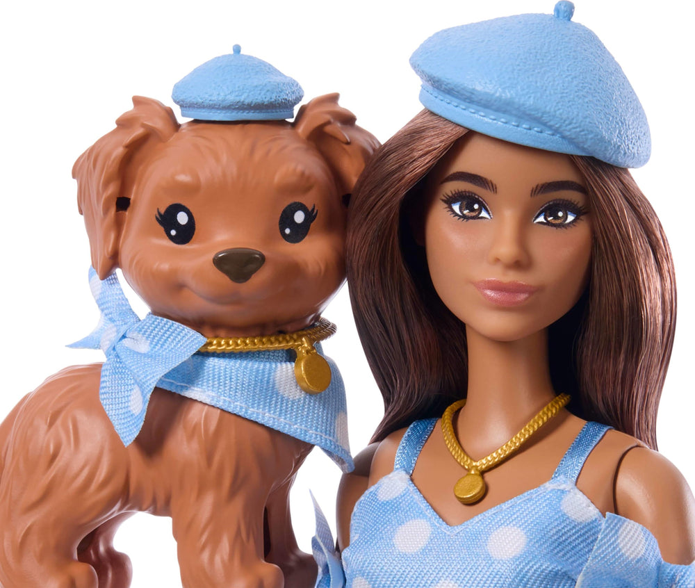Barbie and puppy wear golden necklaces for a chic coordinating touch