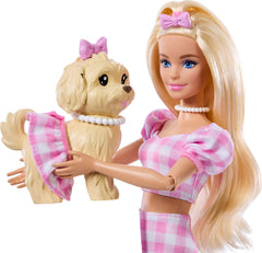 Puppy with bow and ruffle skirt enhances twin-story play.