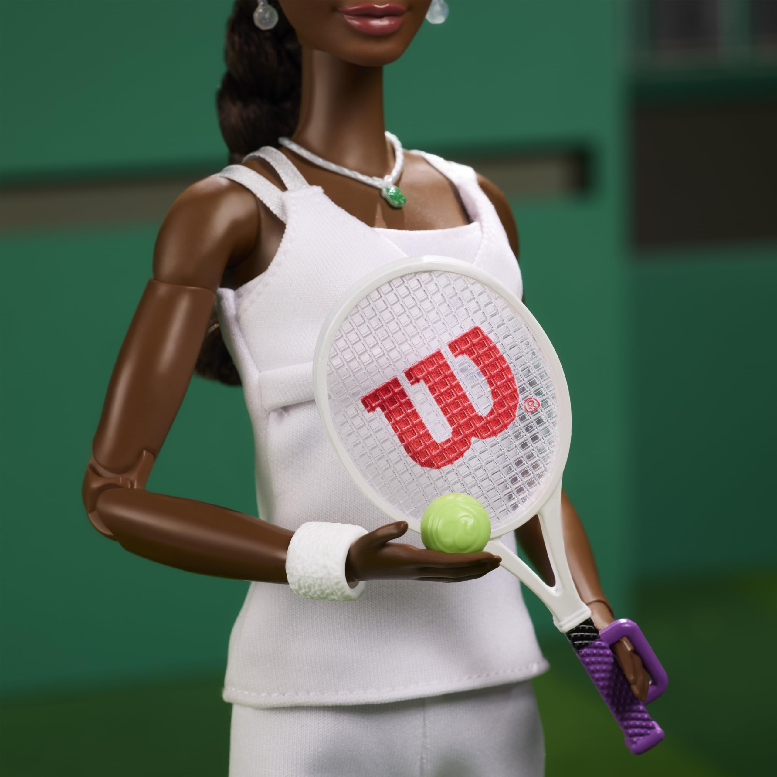 Barbie Venus Williams doll stand and Certificate of Authenticity support premium display.