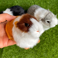 Basuo-9Q guinea pig plush figurine makes a cute photo prop.