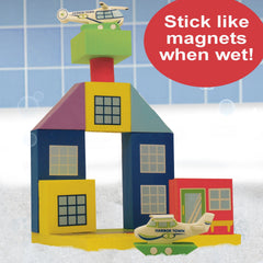 BathBlocks helicopter glides with bath water, sparking storytelling and fine motor exploration.