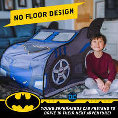 Kids inside Batman Batmobile Pop-Up Tent imagining heroic rescues.