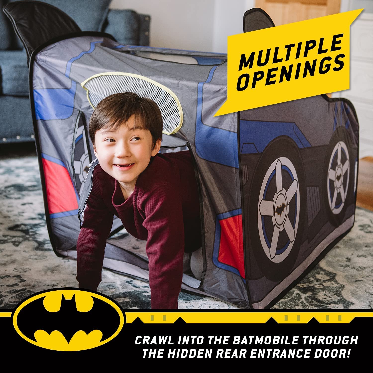 Batmobile Pop-Up Tent poles inserted for sturdy playhouse structure.