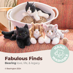 Cleo Siamese cat plush with lifelike details for realistic play.