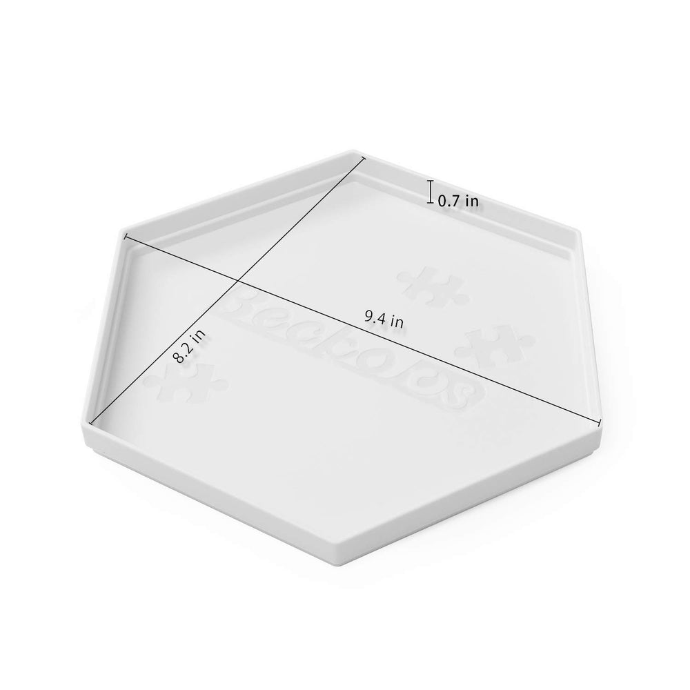 Becko US white ABS puzzle trays arranged to quickly find pieces against colorful puzzles.