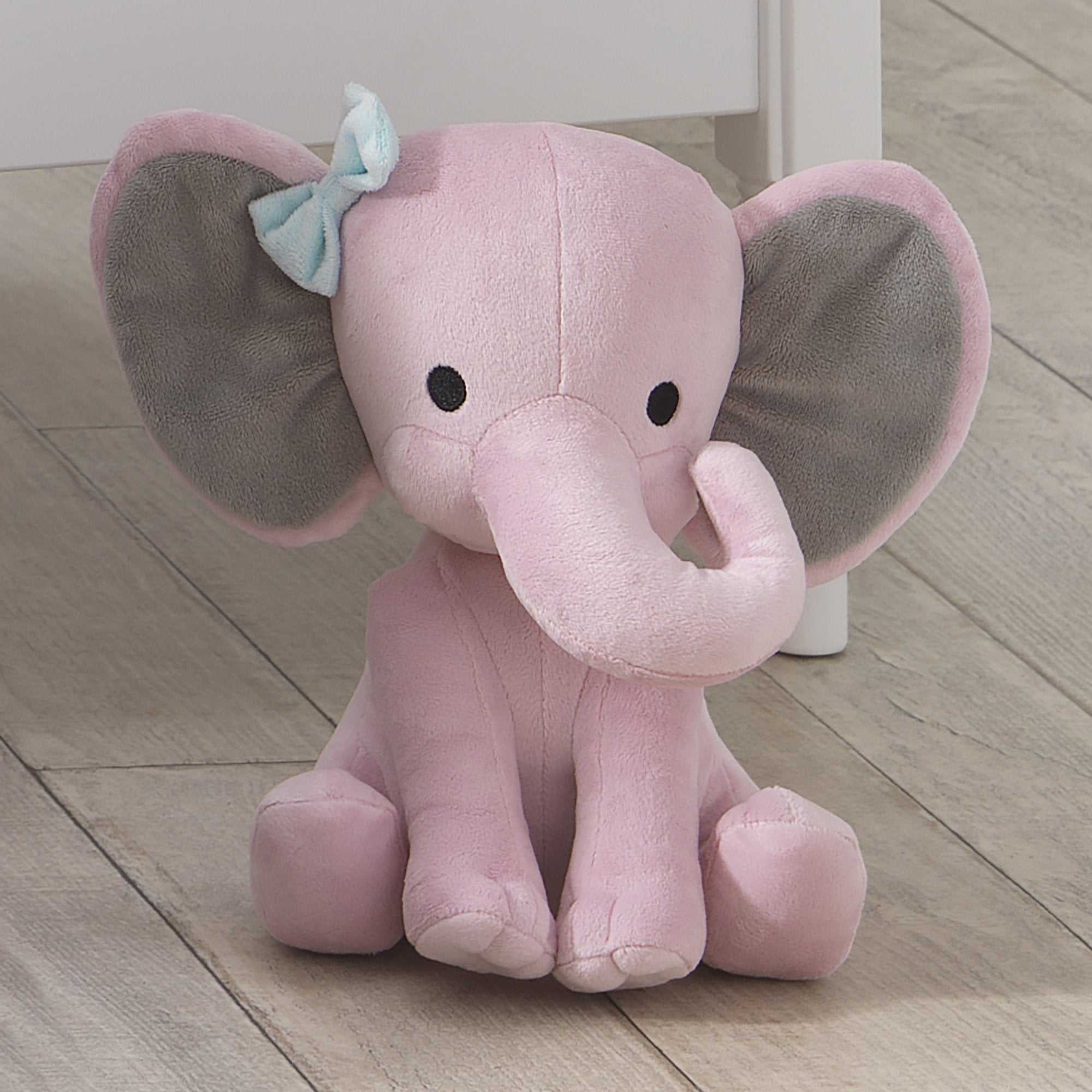 Bedtime Originals Hazel sits 10-inch plush, coordinates with Twinkle Toes collection.