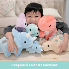 Cute pink T Rex decorates a kid's shelf or bed