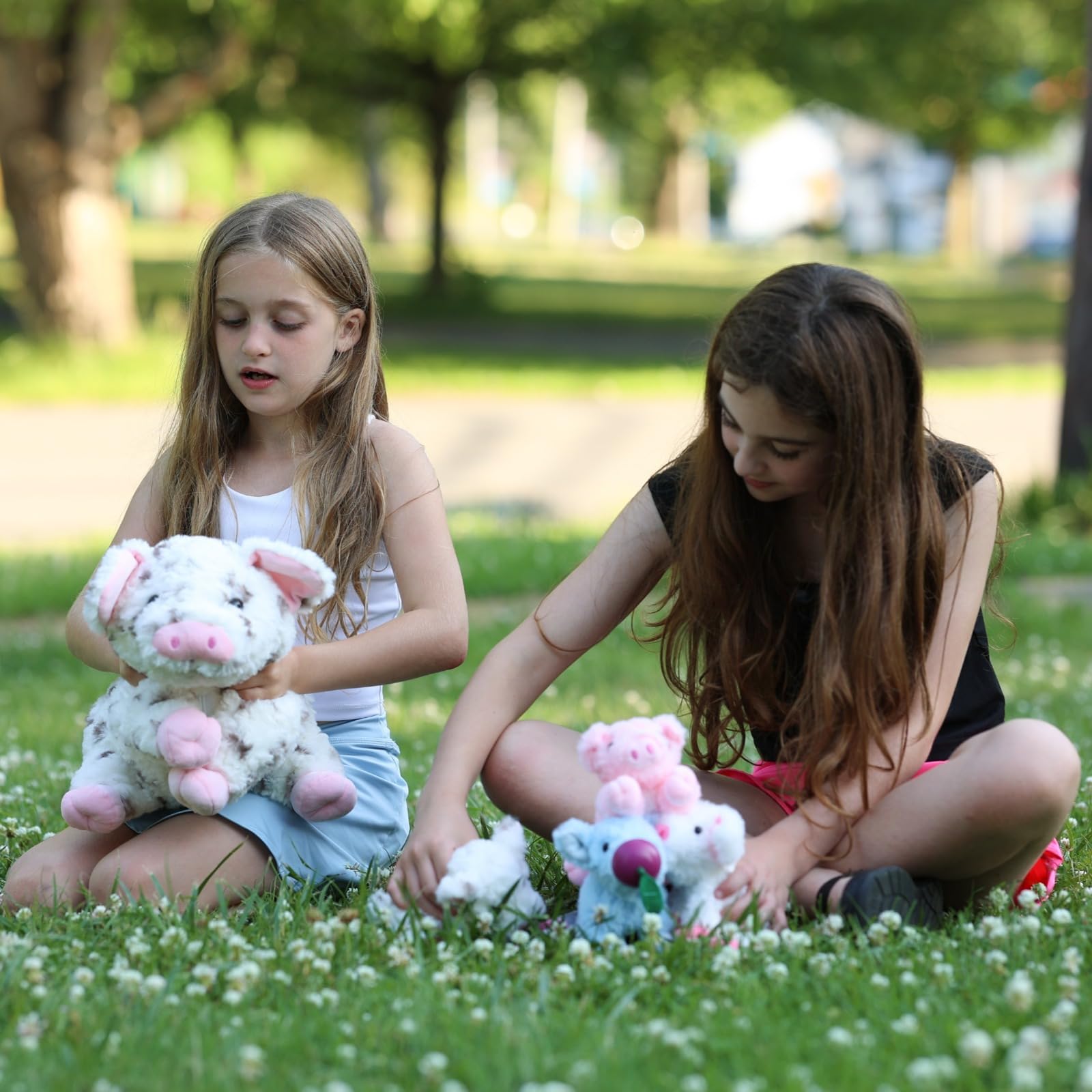 BENINY pig stuffed animal 16-inch zippered belly keeps piglets secure during travel.