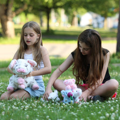 BENINY pig stuffed animal 16-inch zippered belly keeps piglets secure during travel.
