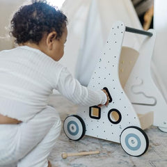 Beright walker with mirror and gears supports visual tracking and problem-solving.