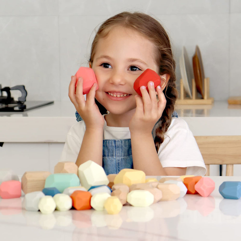 BESTAMTOY stone balancing game helps kids develop balance and problem-solving during play.