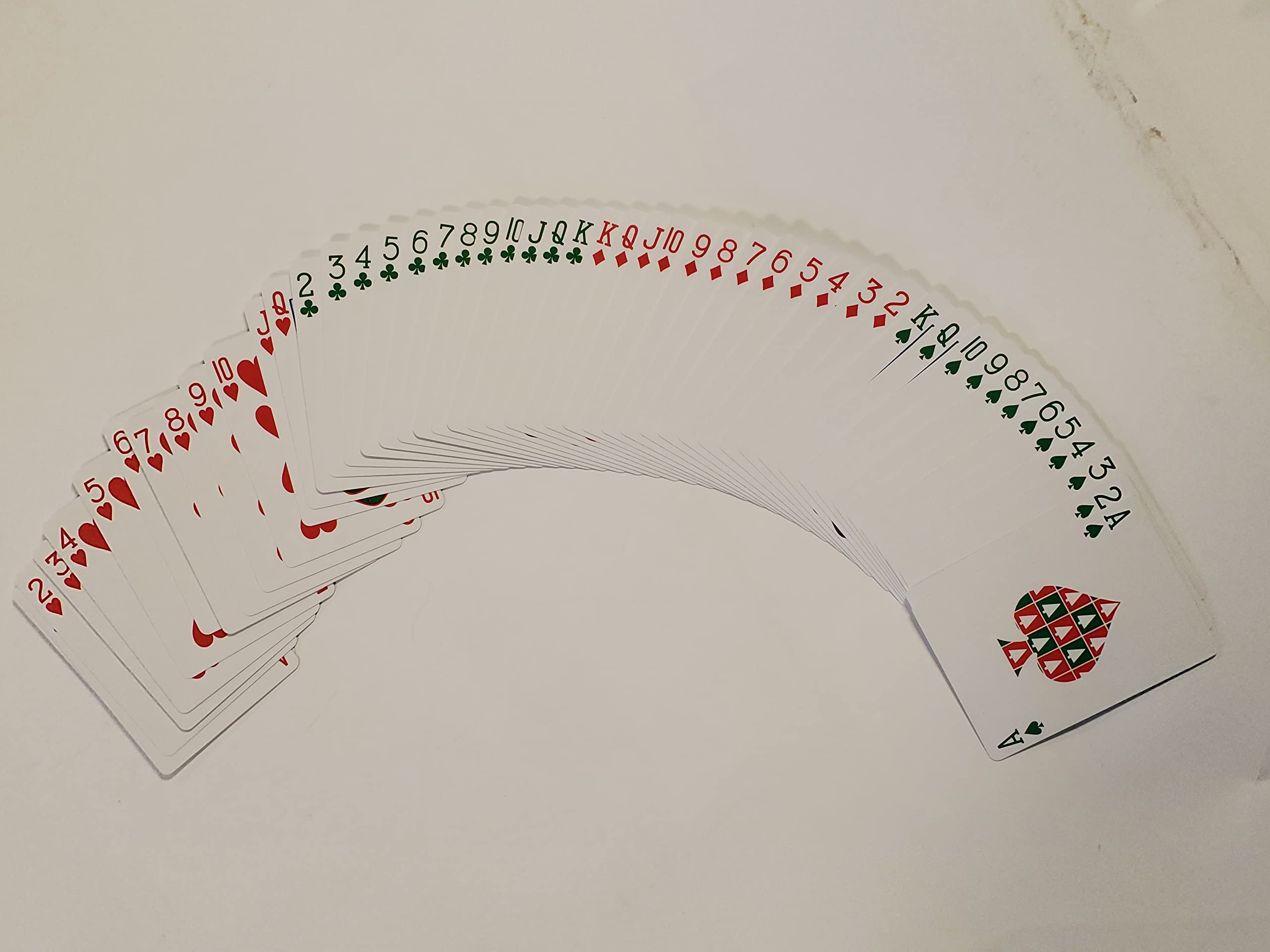 Bicycle Green Back Red Santa magic cards enable Monte trick practice.